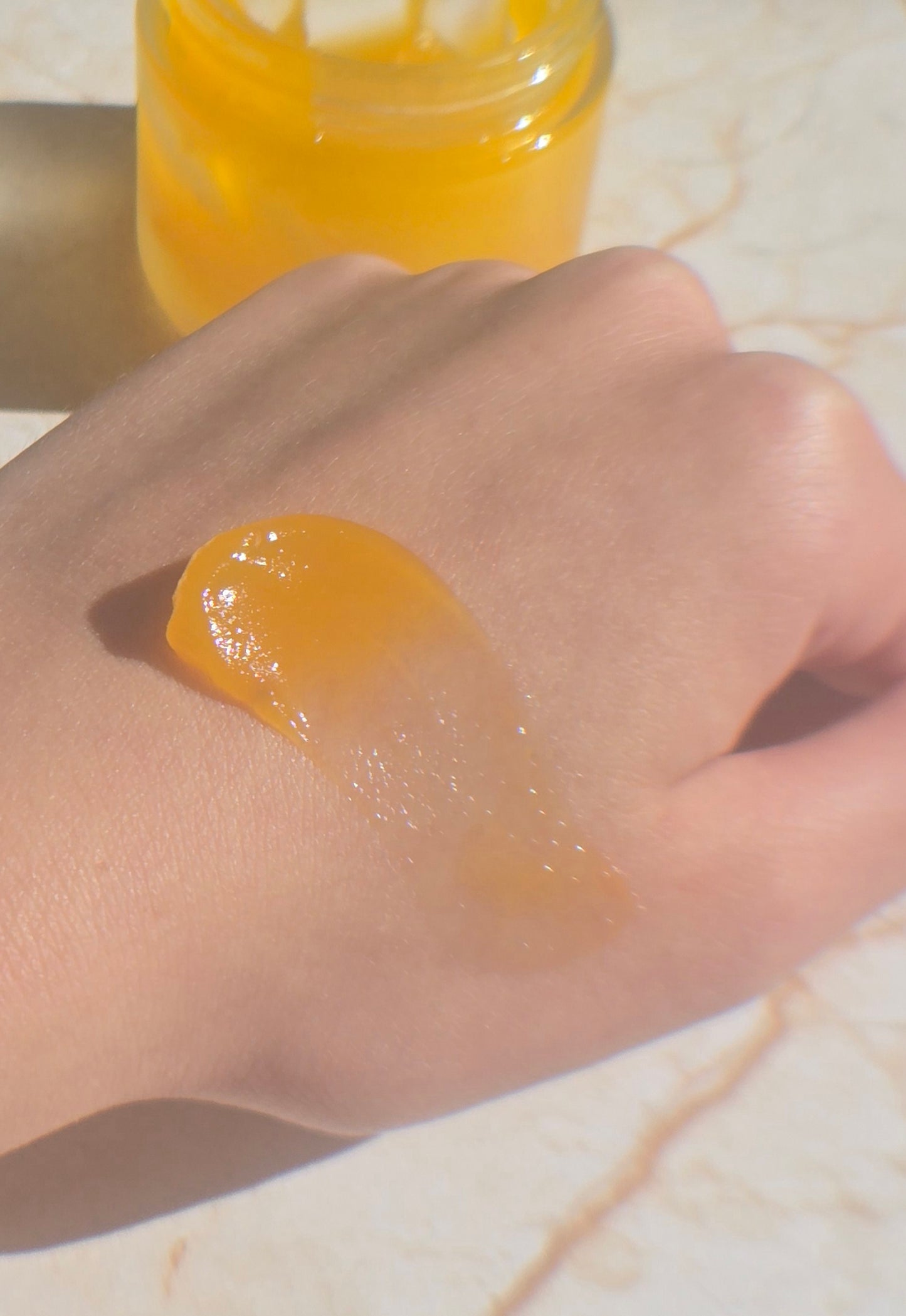 Melt & Glow Cleansing Balm texture – balm-to-oil formula with Kakadu Plum and Bakuchiol, formulated for perimenopausal skin